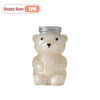 A cute, white bear-shaped reusable water bottle with a silver lid.