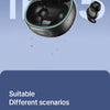 A pair of black HTC invisible sleep earbuds floating in water, shown against a blue background.