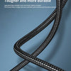Close-up of a black braided printer cable showing its durable texture and twisted design.