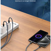 A close-up of a blue charging cable with magnetic suction ends, shown next to a smartphone and a white charging block on a wo