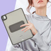 A hand holds a matte protective case for an iPad Pro against a light purple background.