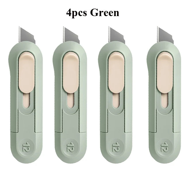 Four green deli mini pocket knives with light pink handles and silver blades.