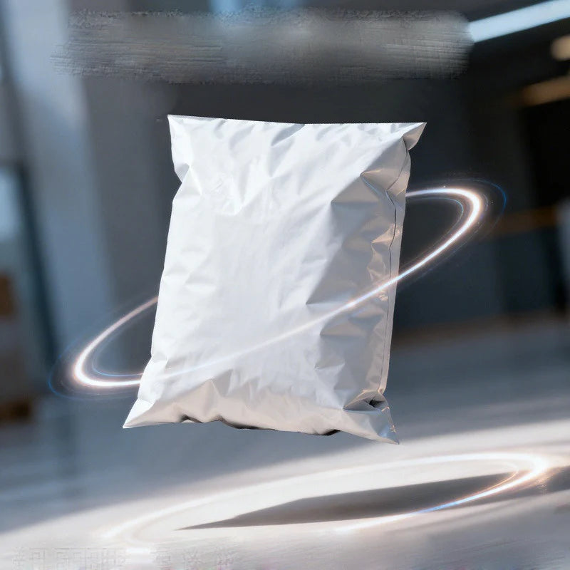A white bulk waterproof packaging bag is suspended in mid-air, surrounded by a glowing ring of light.