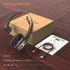 A box containing a wireless headset, a charging cable with a micro USB port, and a user manual on a wooden surface.