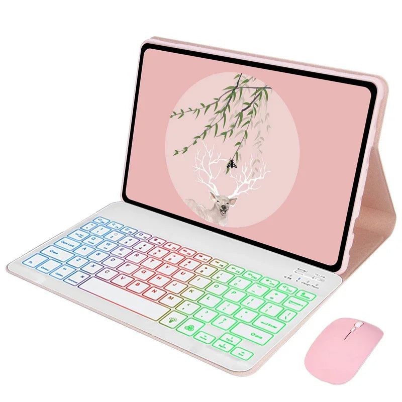 A pink laptop case with a backlit keyboard and a nature-themed design on the screen, next to a pink mouse.