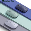 Three colored Ultra-Slim Wireless Bluetooth mice displayed on a gradient background.