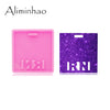 A pink silicone resin mold and a purple glitter resin mold for crafting projects.