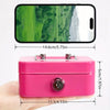 A pink steel cash box with a key lock and removable tray shown next to a smartphone for scale.