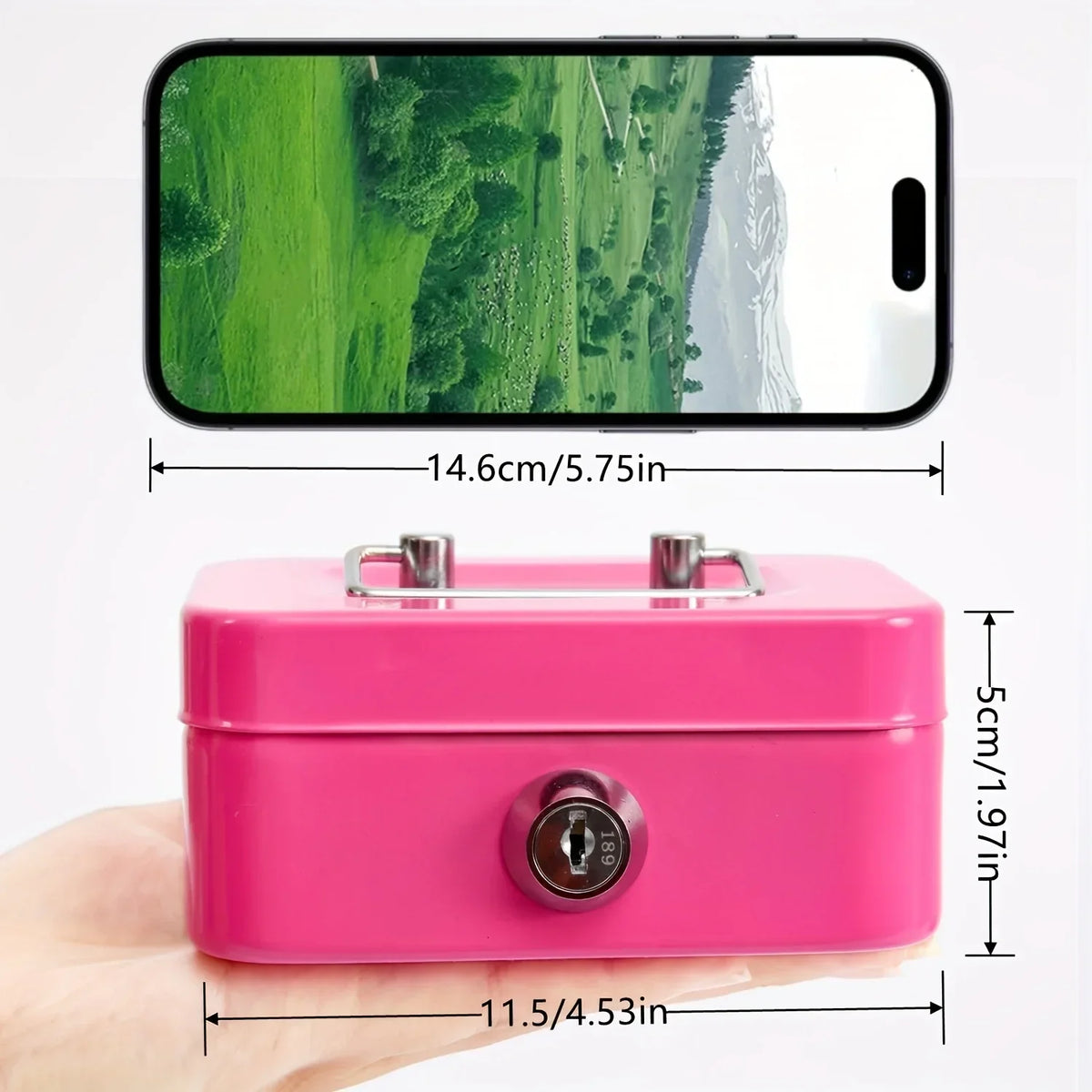 A pink steel cash box with a key lock and removable tray shown next to a smartphone for scale.