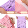 Hands hold a pink reusable plastic mailing bag with a cloud pattern, showing the clear plastic material.