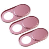 Three pink slim camera sliders or lenses with circular openings.
