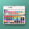 A white storage box containing a solid watercolor paint set with brushes and various colored paints.