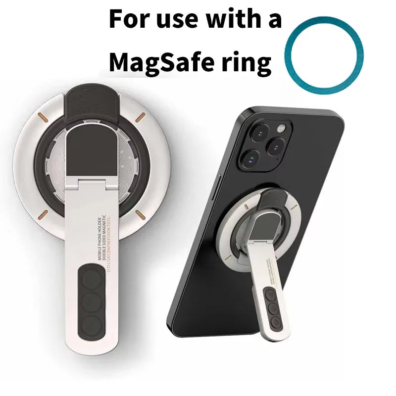 A dual-sided magnetic phone ring holder with a rotating stand shown next to a smartphone.