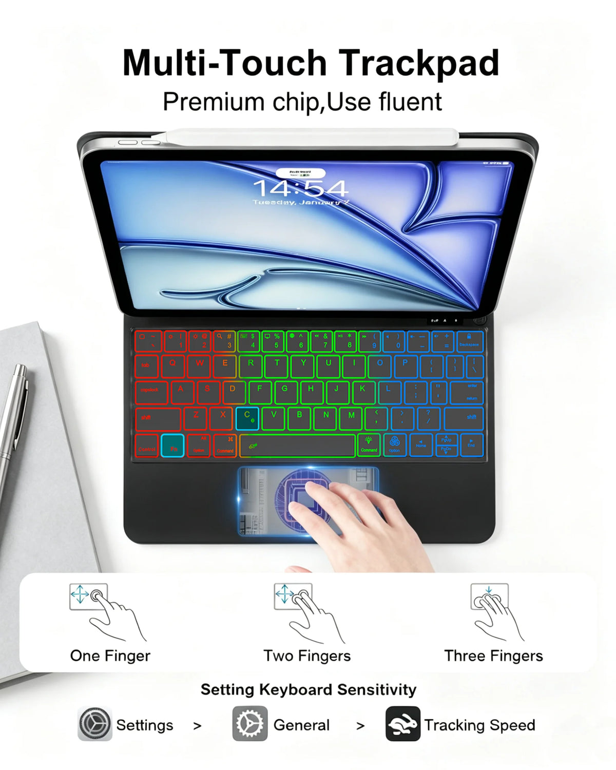 A hand is using a multi-touch trackpad on a black iPad with a Magic Keyboard case.