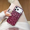 A close-up of a phone case with a glossy pink leopard print and sequins is held against a light background.