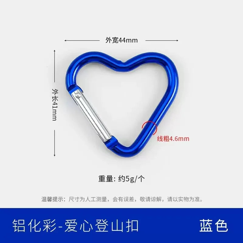 A blue heart-shaped spring clasp and carabiner keychain with a silver connector.