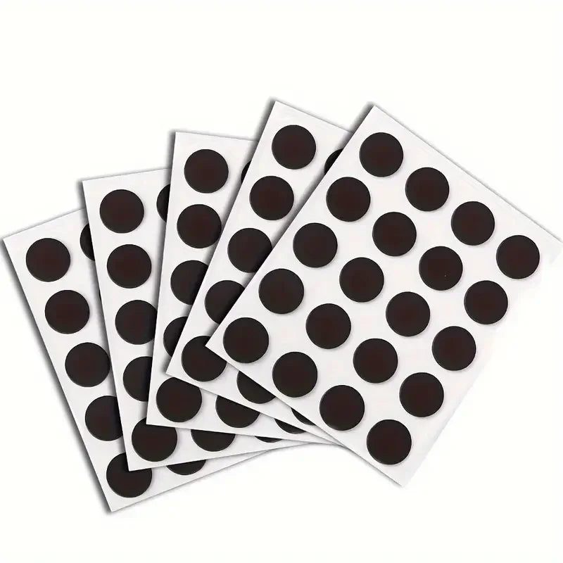 Colección de puntos magnéticos autoadhesivos redondos para organización en empaque blanco.