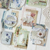 A collection of vintage and floral patterned paper, including textured backgrounds, lace elements, and decorative inserts for
