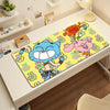 A colorful mouse pad featuring characters from Cartoon W-World, including a blue cat and a pink elephant.