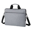 A gray ultra-thin laptop sleeve bag with black carrying straps.