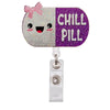 A colorful badge reel holder featuring a purple and white design with the text CHILL PILL and a pink bow.