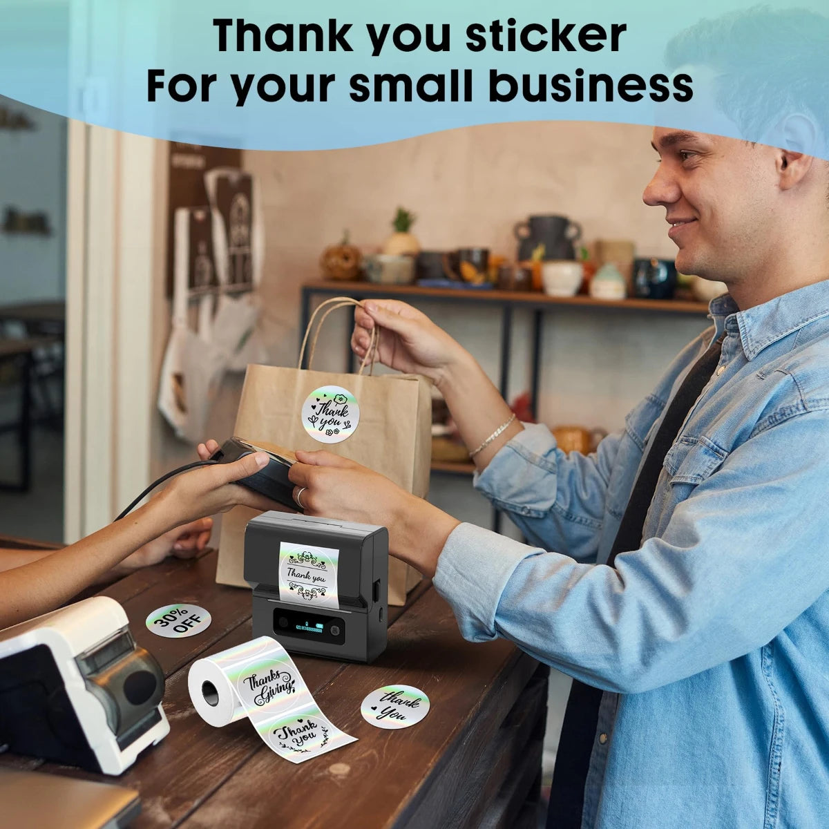A man is applying round thermal sticker labels to a brown paper bag in a business setting.