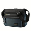 A dark blue women's multifunctional crossbody bag with black trim and strap.