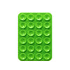 Sujetador de teléfono de silicona verde con múltiples orificios circulares para montar dispositivos.