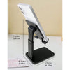 A black adjustable desktop phone stand holding a white smartphone at an angle.