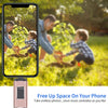 A pink universal USB flash drive is shown next to a smartphone displaying an outdoor scene of children planting a tree.
