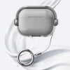 A silver silicone lock case for AirPods is shown resting on a white, curved surface.