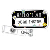 Schwarzer Acryl-Ringe-Halter als Schlüsselanhänger mit dem Text "HELLO I AM DEAD INSIDE", umgeben von kleinen Blumen und Ster