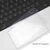 A clear, ultra-thin trackpad protector is shown placed on a black laptop keyboard.