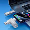 A silver Lenovo flash drive is shown next to a laptop and a smartphone.