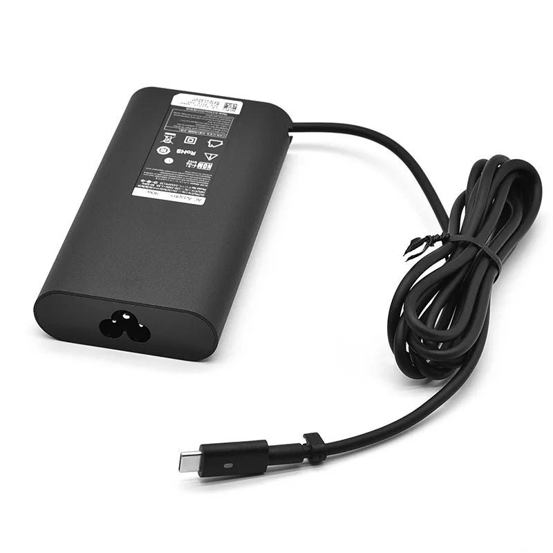 A black 130W USB-C laptop charger with a coiled cable is shown against a white background.