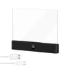 A black acrylic book night light with a clear panel and a USB cable shown next to it.