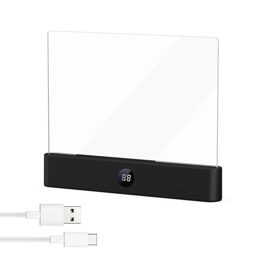 A black acrylic book night light with a clear panel and a USB cable shown next to it.