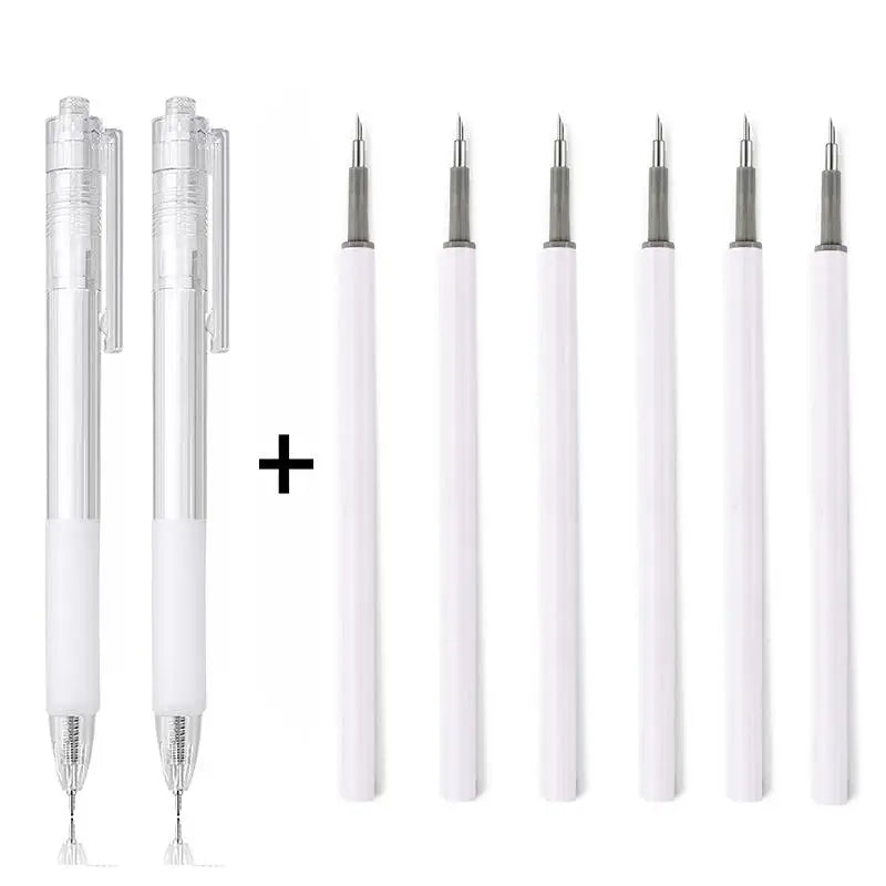 A set of precision utility knives for crafting and scrapbooking, shown with various blade sizes.