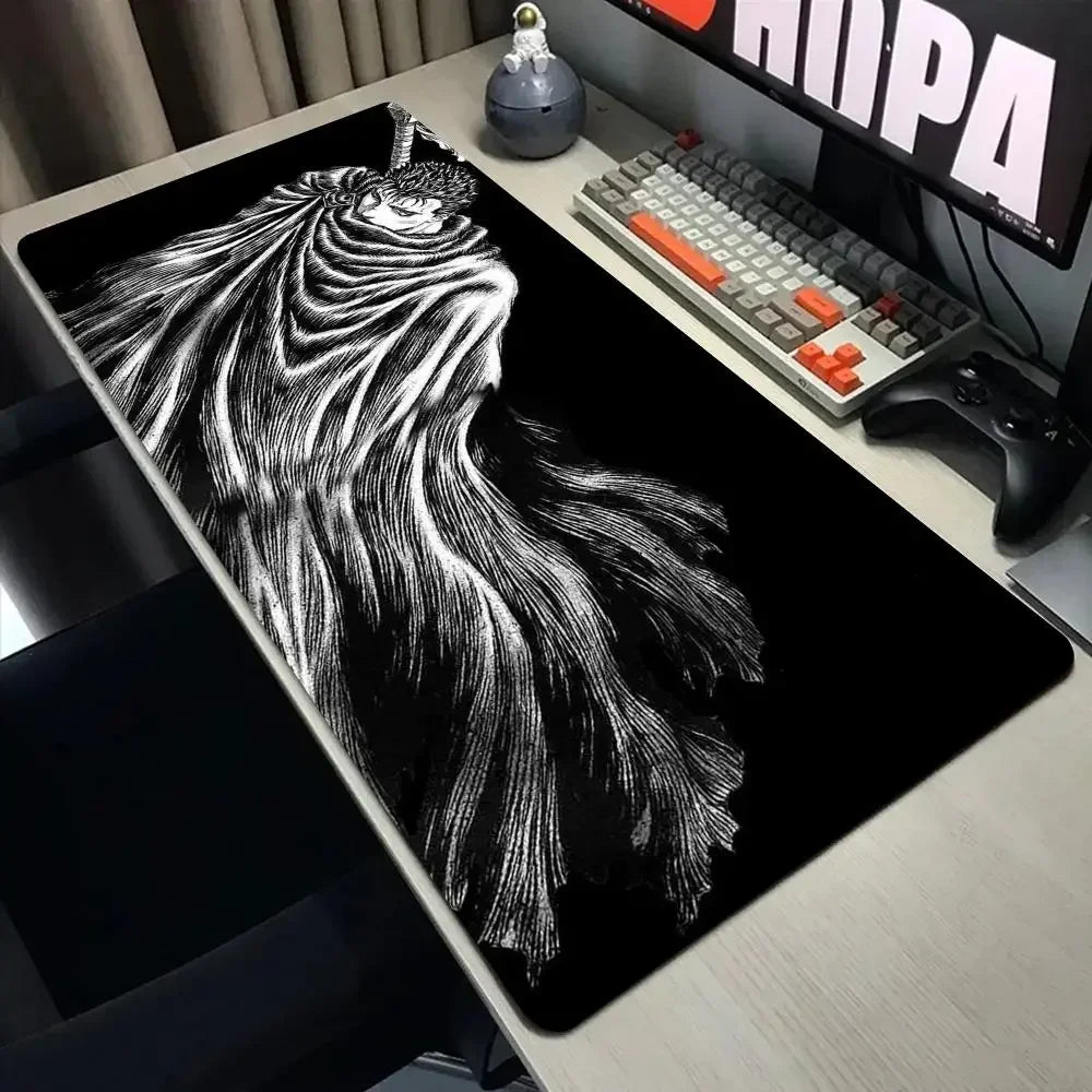 A large black mouse pad featuring a detailed white drawing of a flowing, long-haired character from Berserk anime.