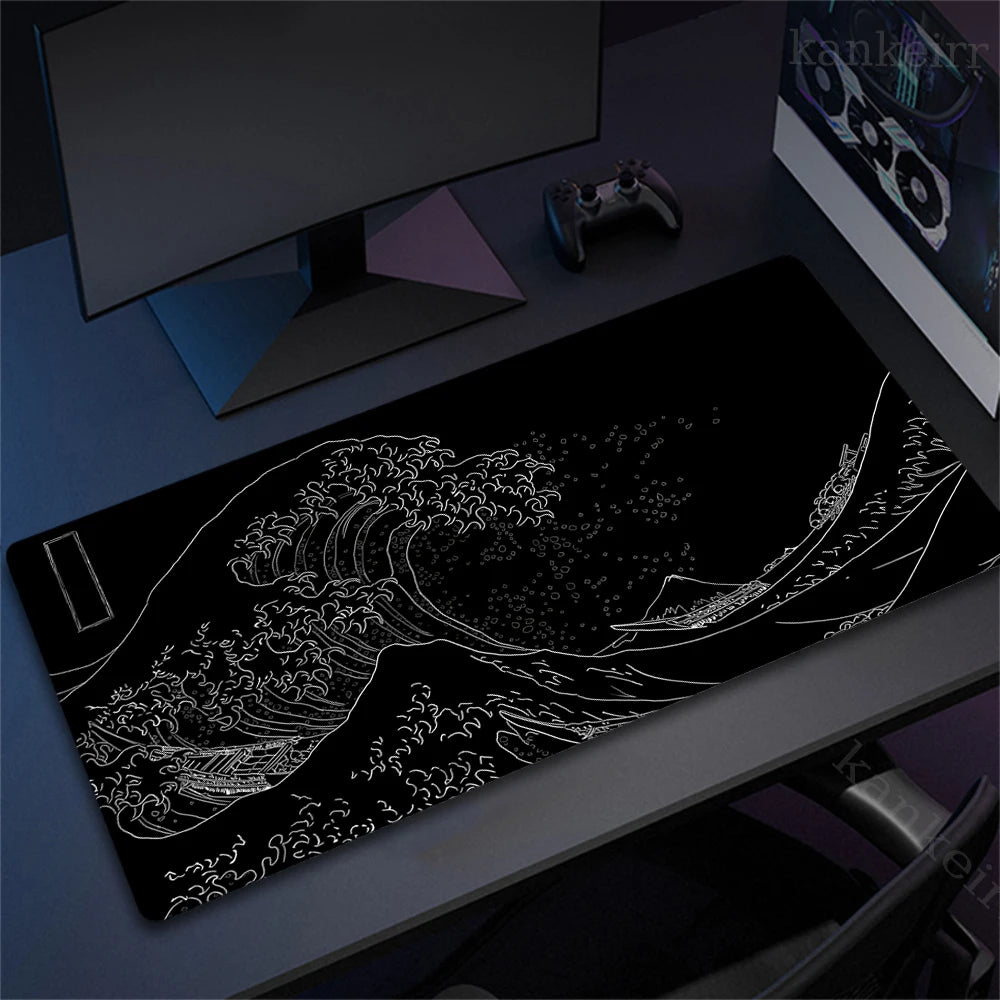 A black desk mat mousepad featuring a white line art illustration of a large ocean wave.