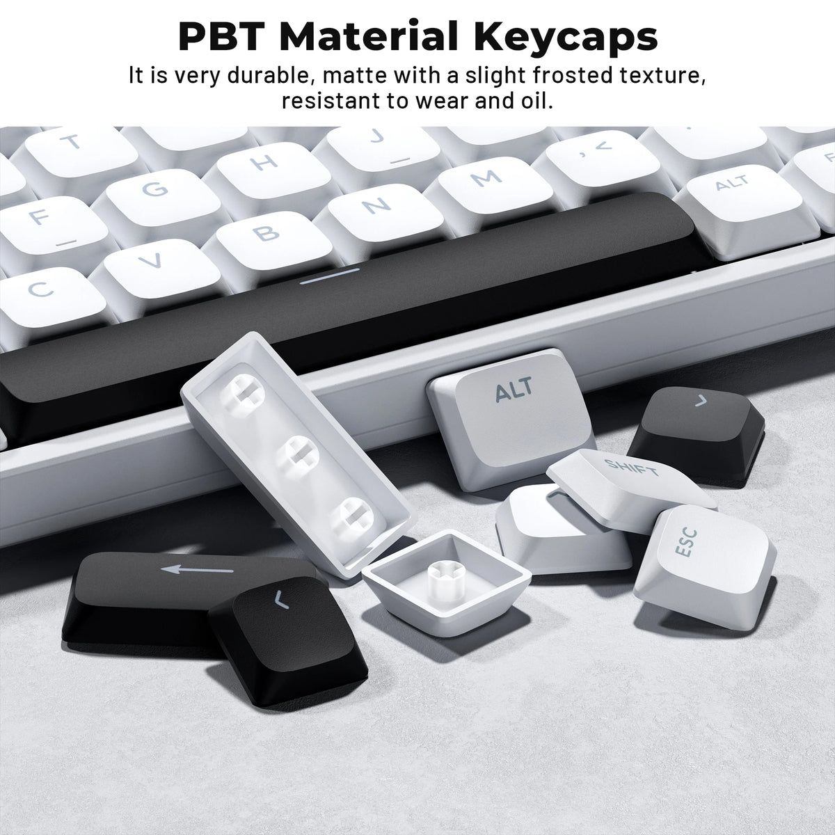 Close-up view of durable PBT material keycaps including letters, function keys, and arrow keys on a keyboard.