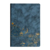 A dark blue luxury PU leather notebook featuring gold foil illustrations of mountains, birds, and flowers.