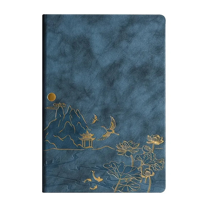 A dark blue luxury PU leather notebook featuring gold foil illustrations of mountains, birds, and flowers.