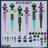 A set of six bead pens featuring witch charms and various colors including purple, green, black, and iridescent beads.