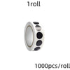 A roll of round assorted color dot labels for organization, showing the cylindrical packaging.