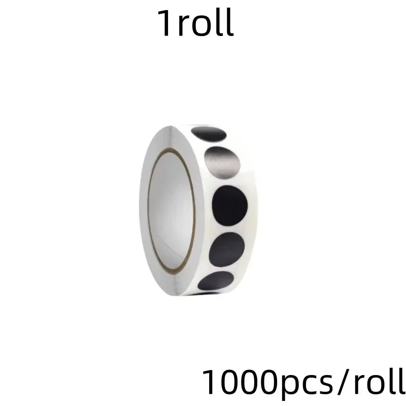 A roll of round assorted color dot labels for organization, showing the cylindrical packaging.