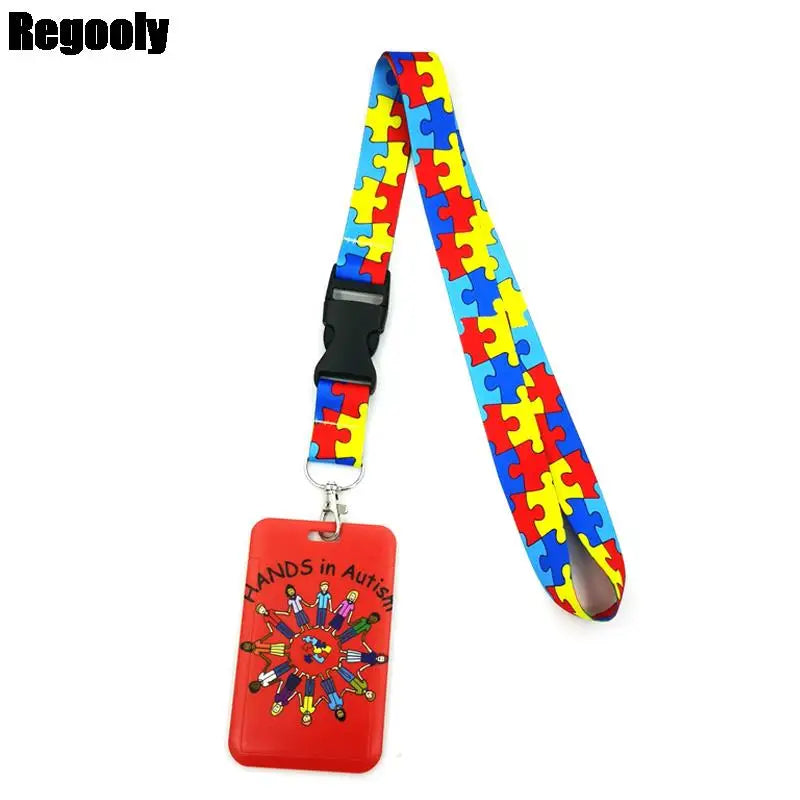 Anime-Muster-Lanyard-Anhänger mit farbenfrohen Puzzle-Stücken auf rotem Hintergrund