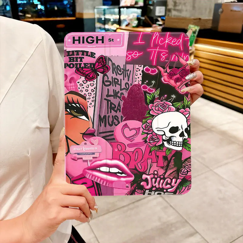 A pink and black graphic tablet case featuring a skull and butterfly design.
