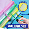 Bolsa organizadora con tirador de cremallera rosa y verde con ventana transparente para colgar documentos.