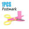 One piece of pink postmark stamp shown with yellow scissors for crafts and DIY projects